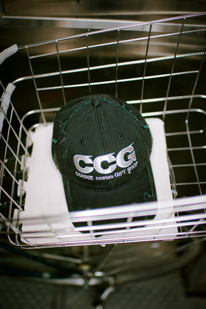 
                  
                    Pre-order, shipping in early December Distressed CCG CAP / CONNIE COSTAS
                  
                