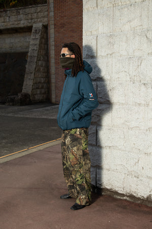 
                  
                    Breezy Neck Warmer / Element x Millet
                  
                